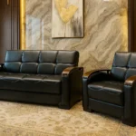 3+2 leather sofa bed black color wioth brown arm rests brown nad cream designed walls luuxury room