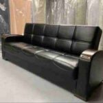Black leather sofa bed in 3 seater