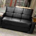 two seater black leather sofa bed with storage