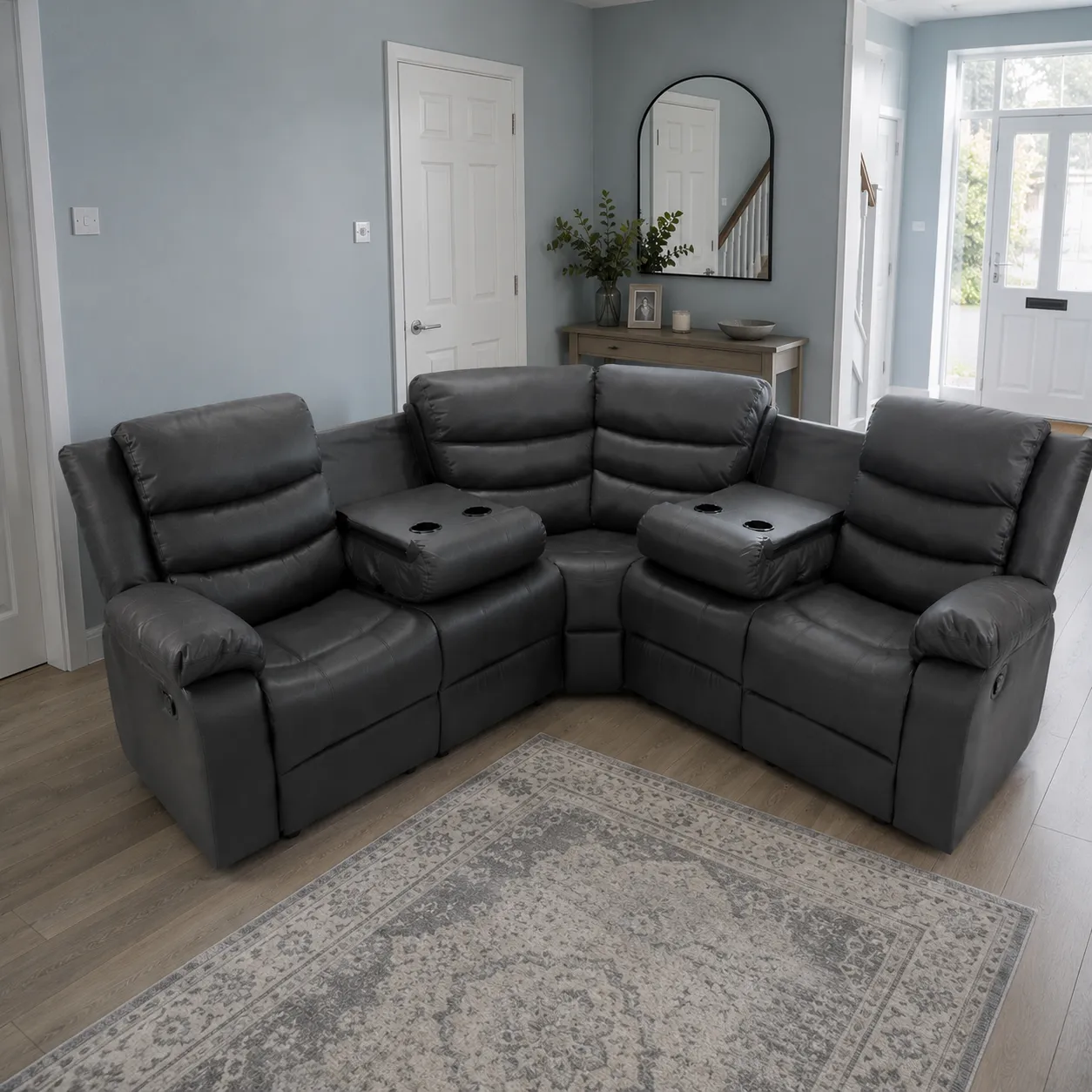 6 seater leather corner sofa recliner sofa in a bright sunroom with large windows, French doors, pale blue-grey walls, light flooring, potted plants, and natural daylight.