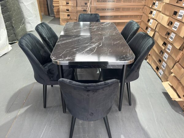 black wood dining table with six chairs