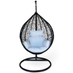 black large egg chair with white cushions