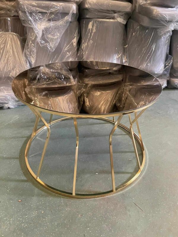 Small round golden coffee table