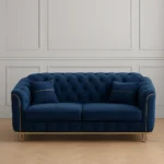 Blue plush sofa set styled in luxury living room with decorative pillows and modern decor
