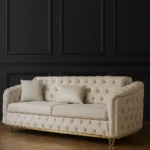 Detail view of white ball-free foam sofa with elegant tufting and gold finished steel leg