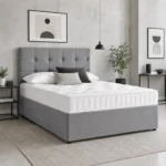 Divan bed gray frame and white mattress in bedroom
